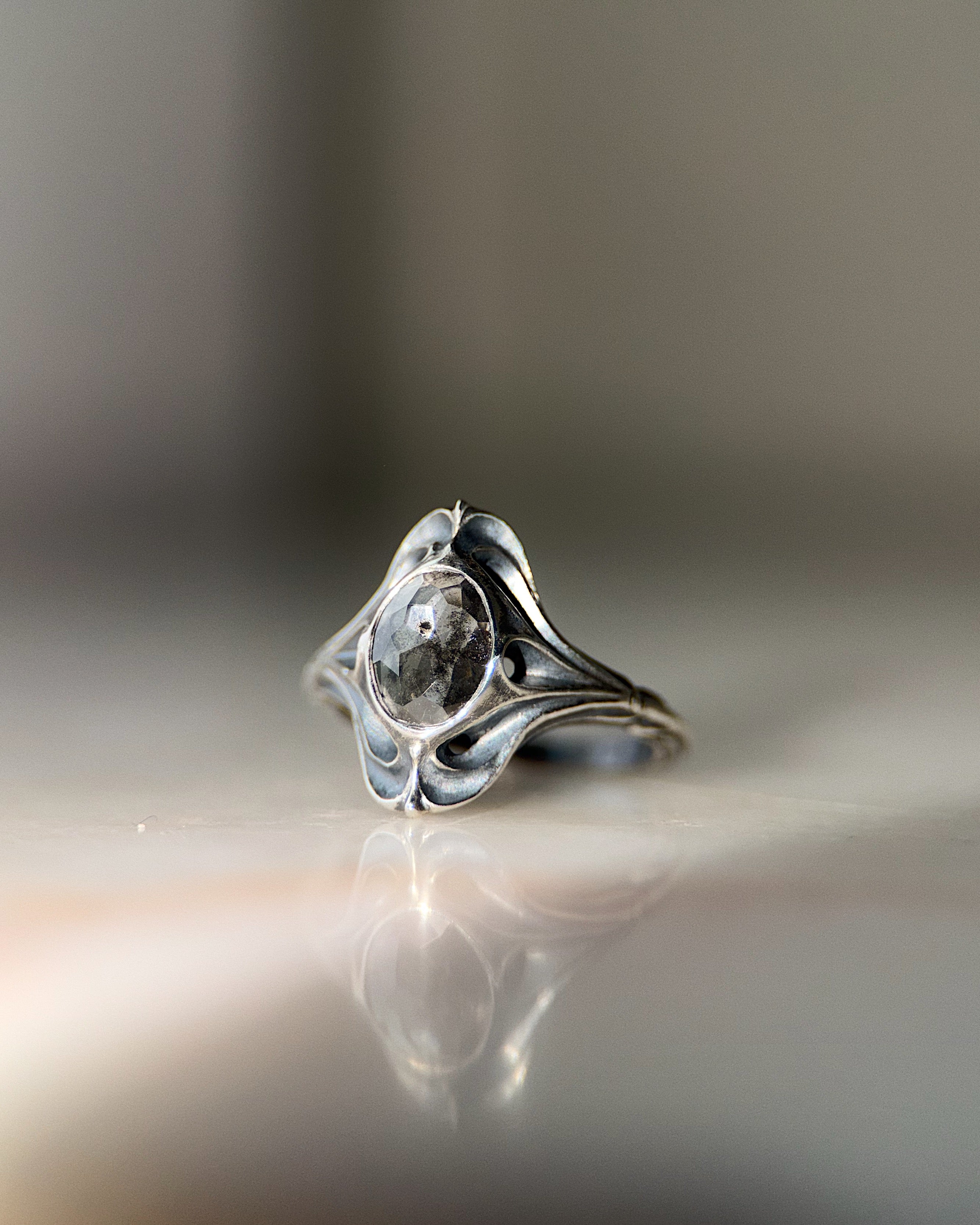 ecclesia navis ring in sterling silver set wit 6 x 8 mm oval diamond