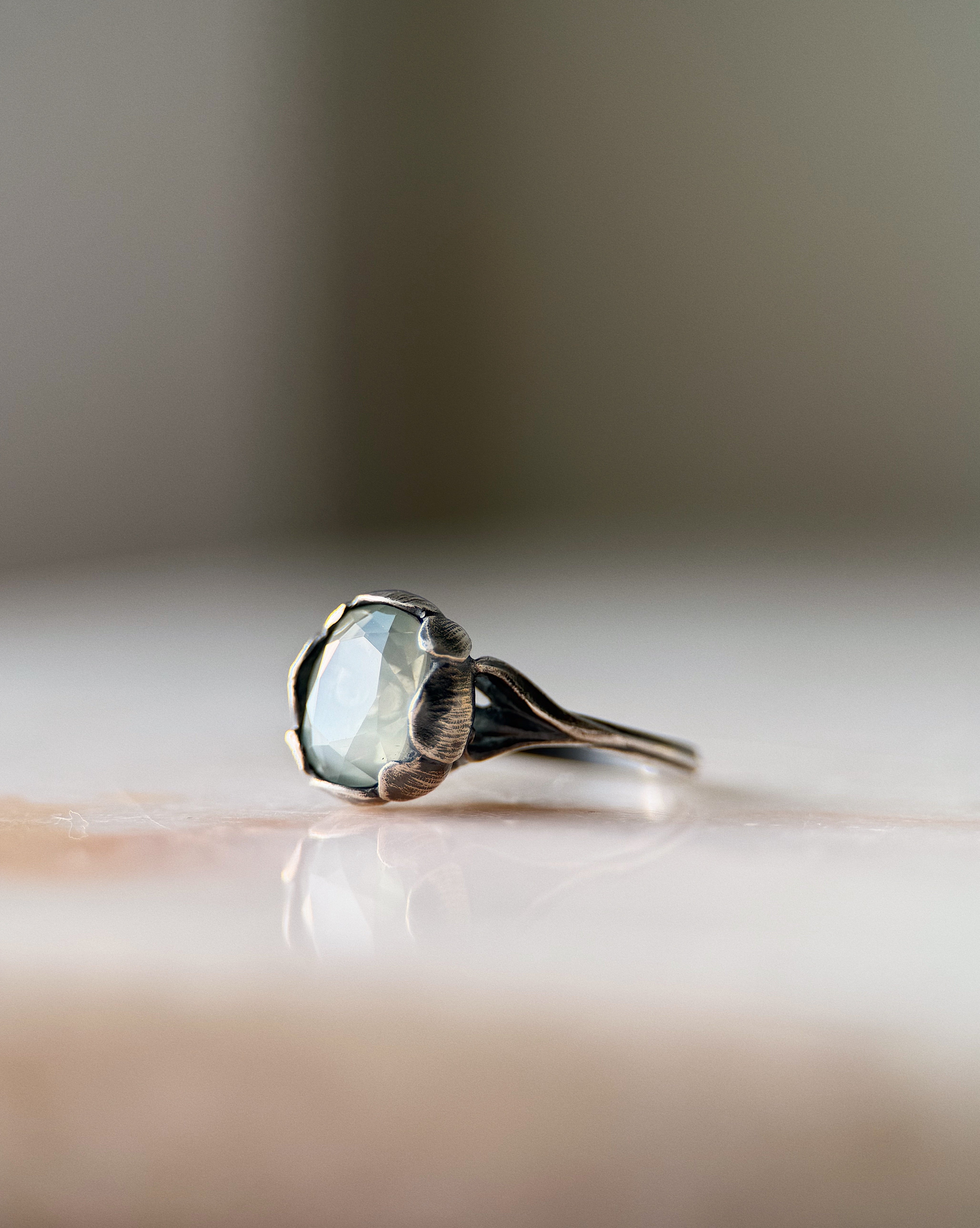 natasha pt 2, sterling silver ring set with 10 × 8 mm cushion-cut green moonstone